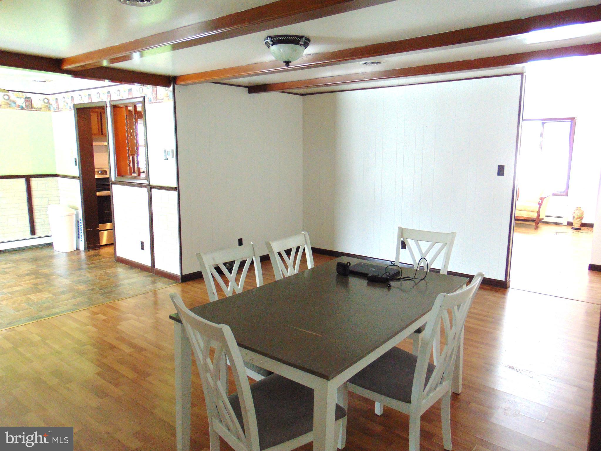 2029 Reed Road Knoxville, MD 21758 - Photo 24 of 96 formal dining room exposed beams