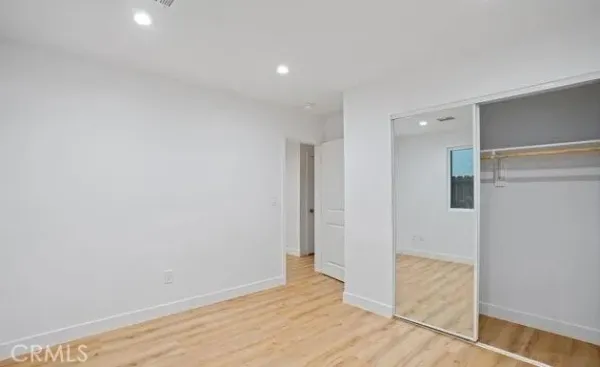 a bathroom with a sink toilet vanity and bathtub