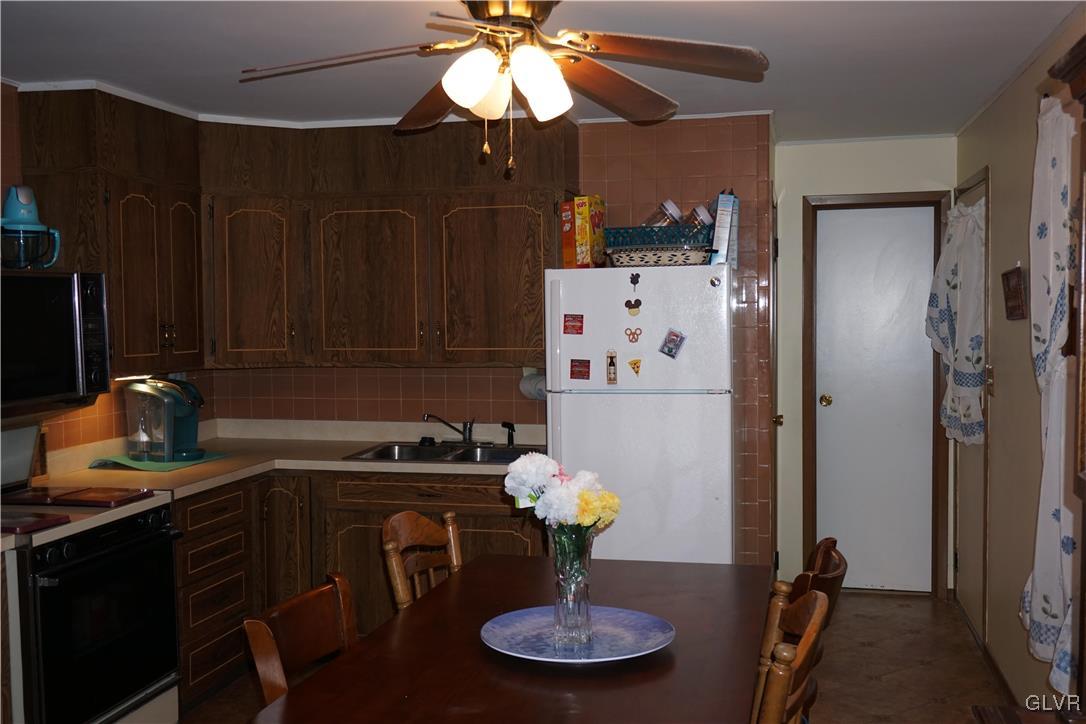 1985 Bathgate Road Bethlehem, PA 18018 - Photo 19 of 22 a kitchen with a refrigerator and a sink