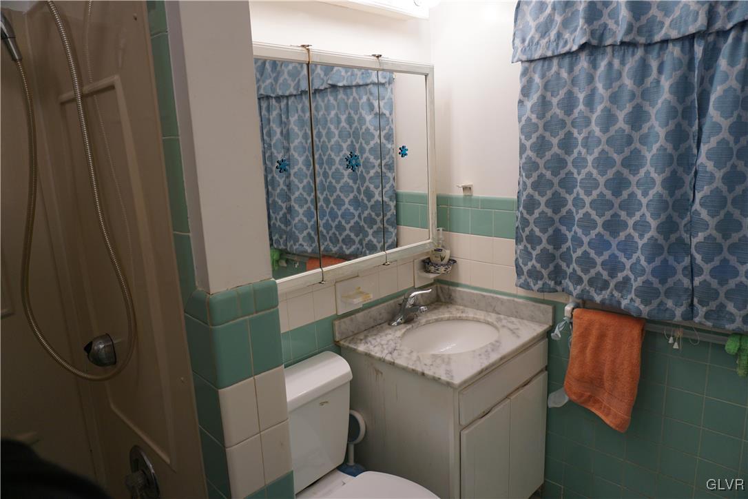 1985 Bathgate Road Bethlehem, PA 18018 - Photo 6 of 22 a bathroom with a sink toilet and shower