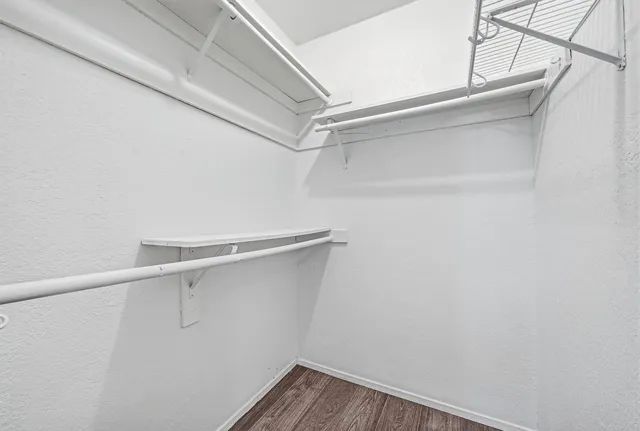 a view of a room with racks on the wall