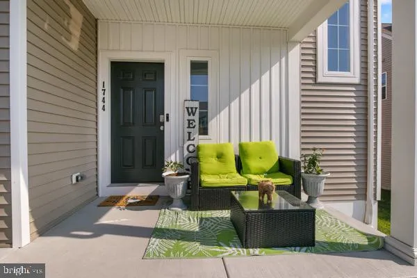 a house view with a seating space