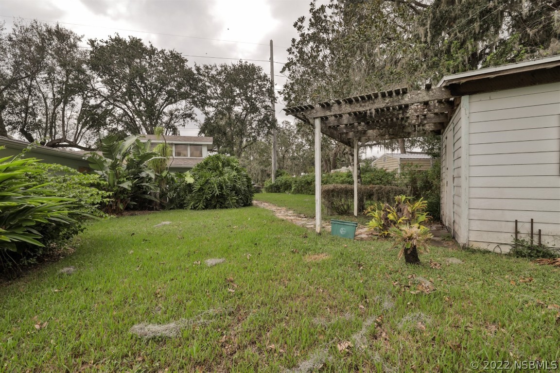 1701 Orange Tree Drive Edgewater, FL 32132 - Photo 21 of 21 a view of a backyard