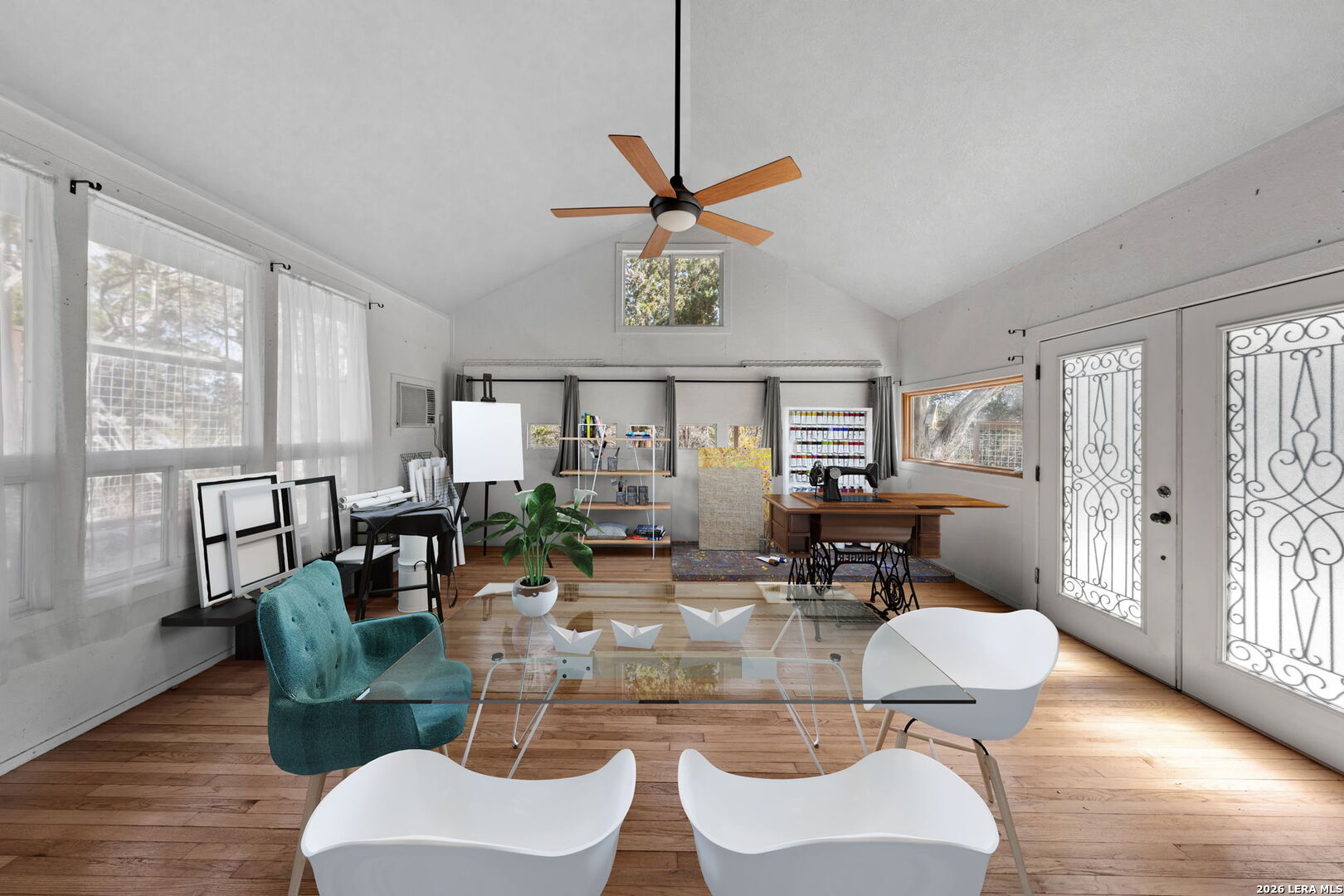 667 Ranch Rim Drive West Ingram, TX 78025 - Photo 34 of 50 a view of a dining room with furniture window and wooden floor