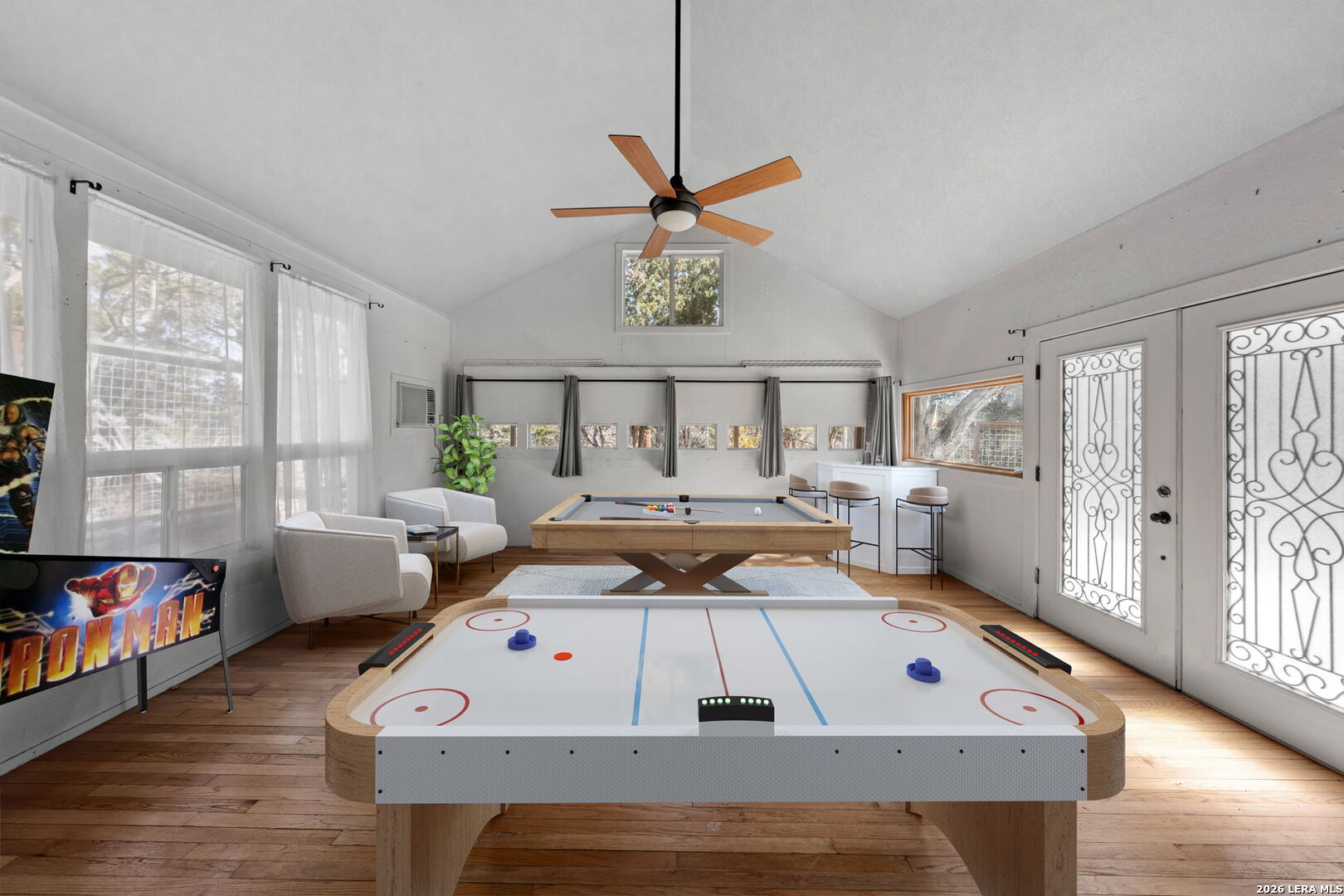 667 Ranch Rim Drive West Ingram, TX 78025 - Photo 35 of 50 a living room with furniture and a large window