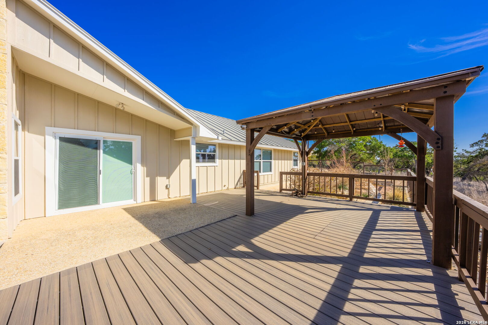 667 Ranch Rim Drive West Ingram, TX 78025 - Photo 49 of 50 a balcony with wooden floor