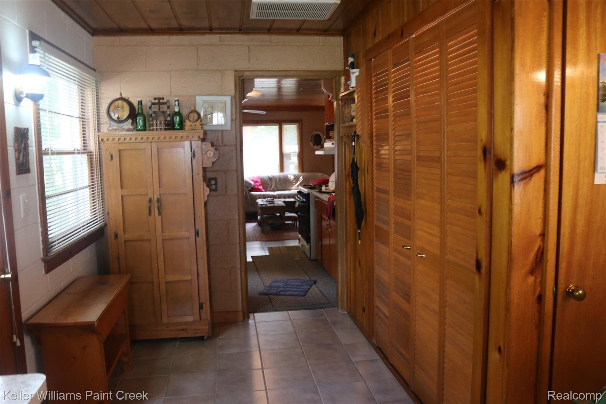 7378 Port Austin Road Caseville, MI 48725 - Photo 27 of 35 Mud Room , Laundry Closet area Pantry Closet and Bench included
