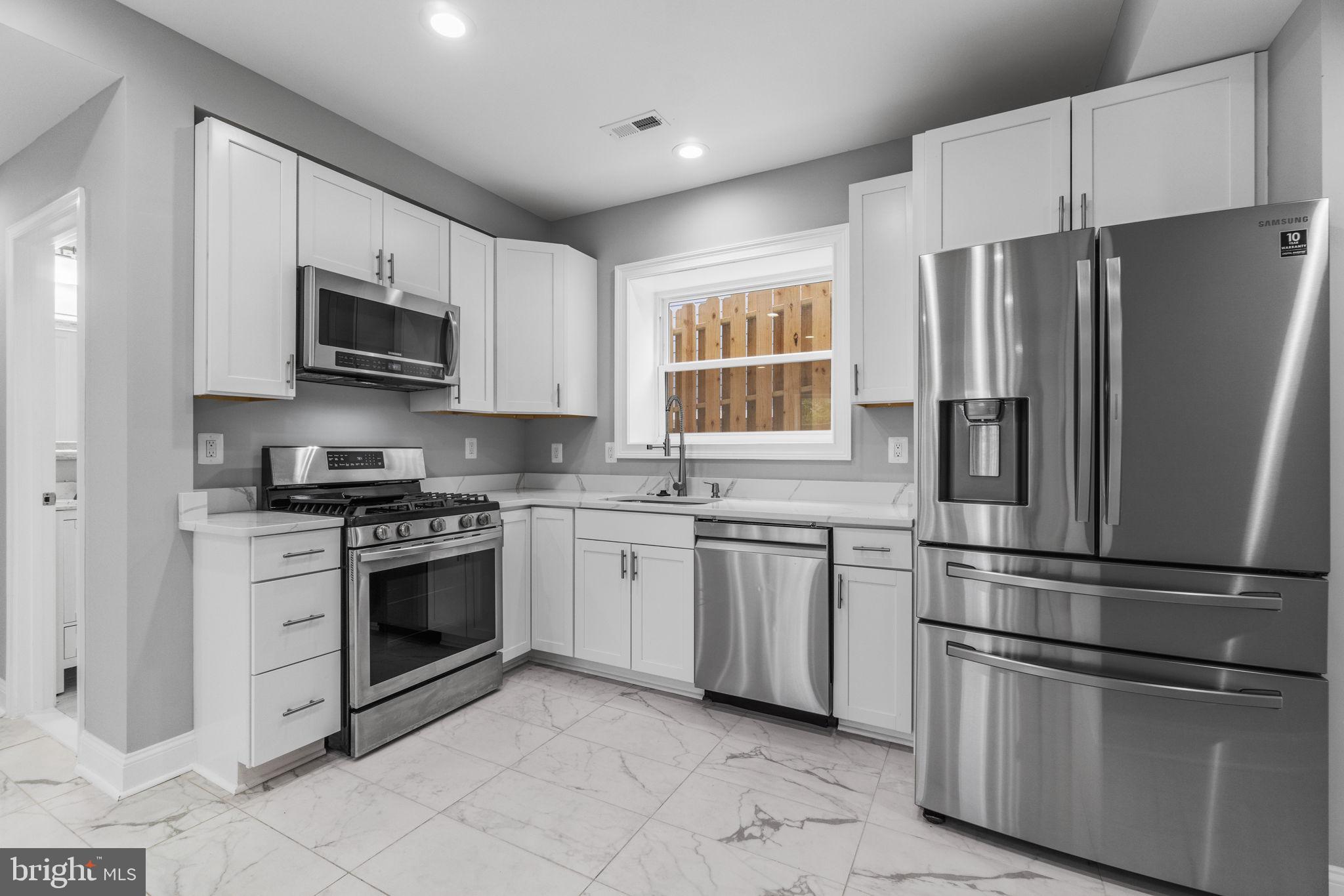 3110 Perry Street, Unit B Mount Rainier, MD 20712 - Photo 2 of 11 Lower level kitchen