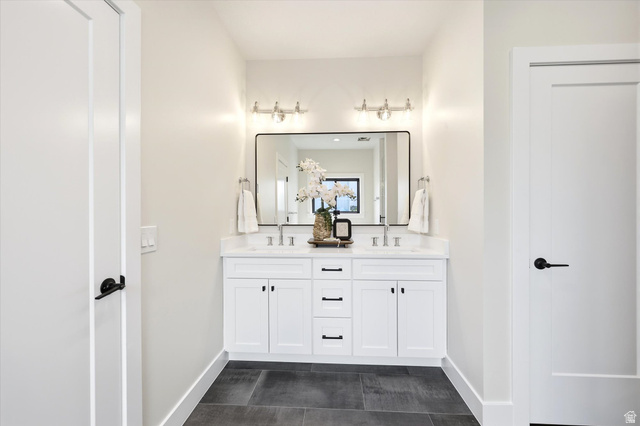 134 South Chamberlain Street Mapleton, UT 84664 - Photo 18 of 40 Dual vanity with white cabinetry and integrated sinks