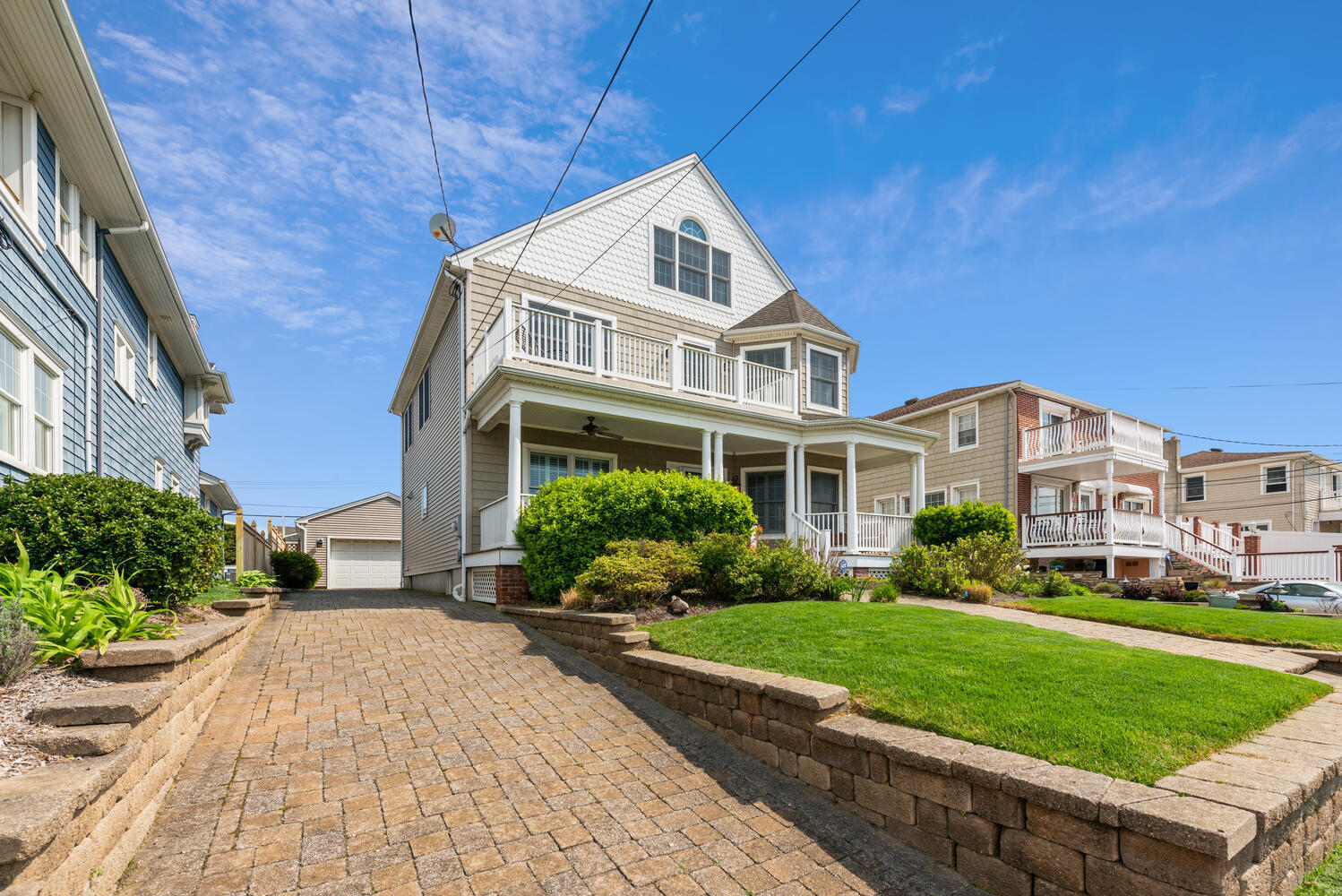 104 3rd Avenue Bradley Beach, NJ 07720 - Photo 2 of 40 a front view of a house with a yard