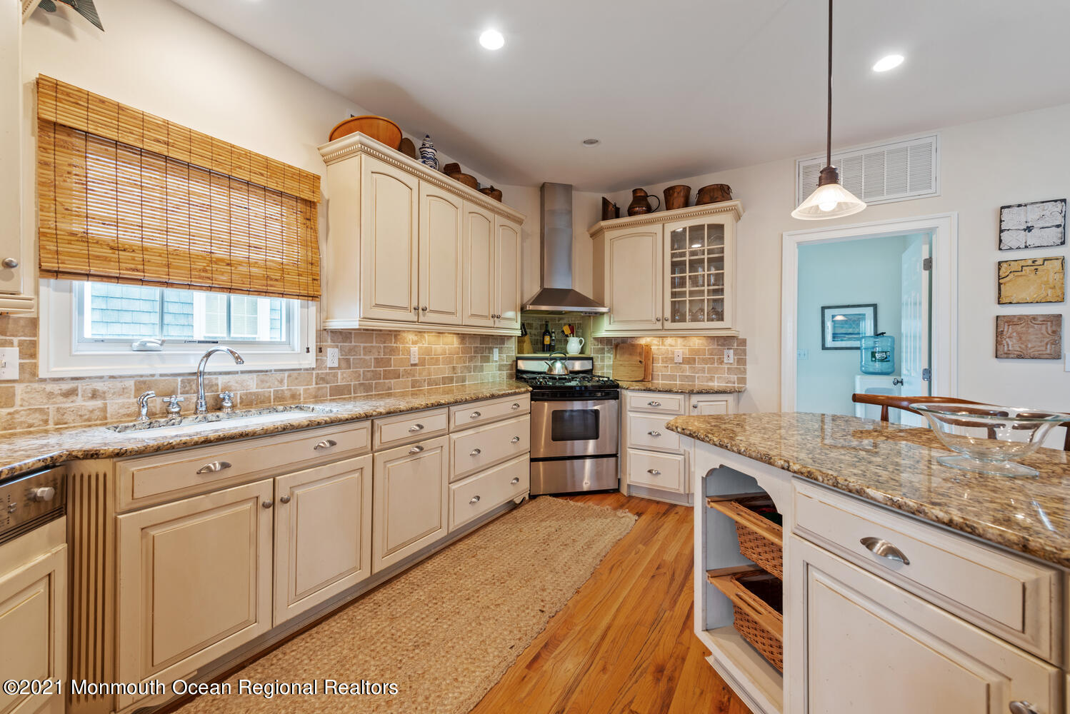 104 3rd Avenue Bradley Beach, NJ 07720 - Photo 11 of 40 a kitchen with granite countertop cabinets stainless steel appliances a sink and a window