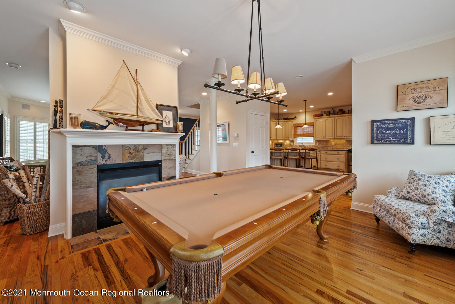 104 3rd Avenue Bradley Beach, NJ 07720 - Photo 14 of 40 a living room with furniture a table and a fireplace