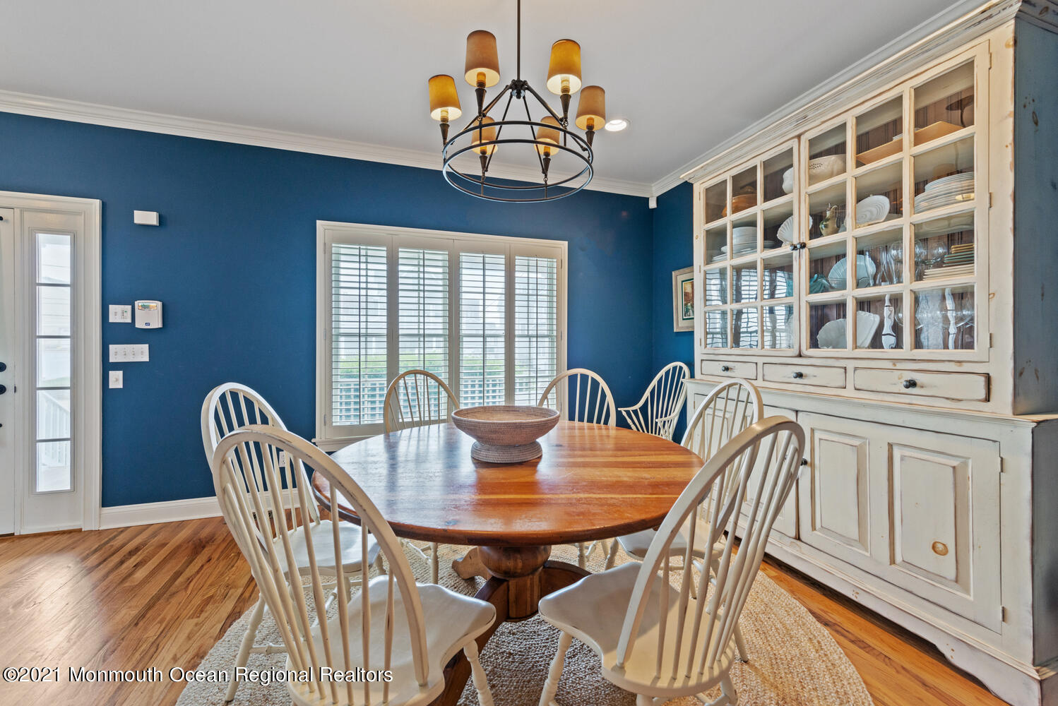 104 3rd Avenue Bradley Beach, NJ 07720 - Photo 15 of 40 a view of a dining room with furniture a chandelier and wooden floor