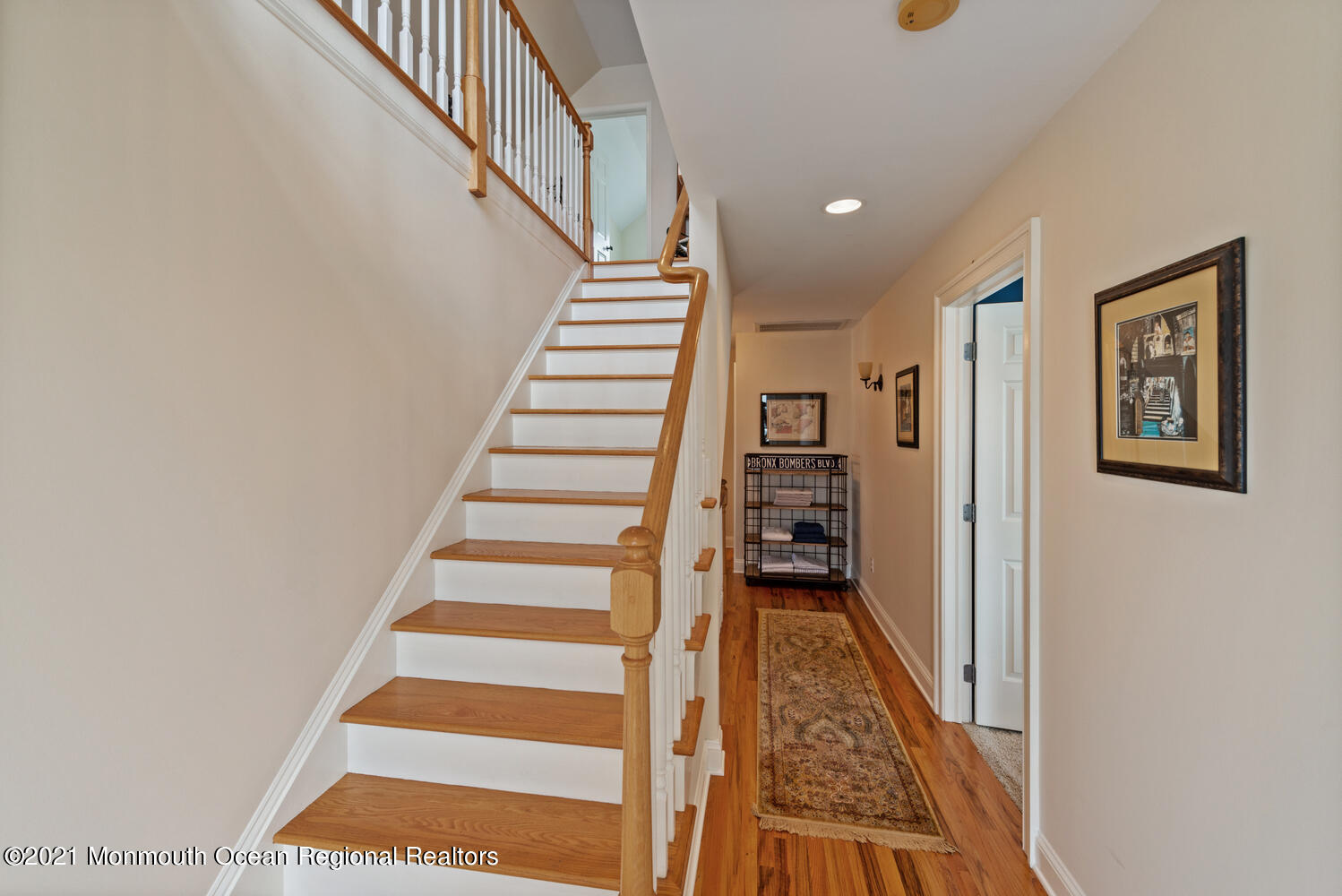 104 3rd Avenue Bradley Beach, NJ 07720 - Photo 16 of 40 a view of a hallway with wooden floor and entryway