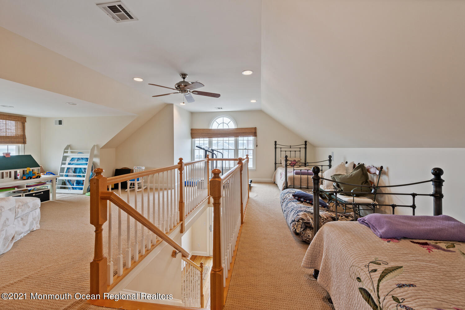 104 3rd Avenue Bradley Beach, NJ 07720 - Photo 26 of 40 a bed room with furniture and a chandelier