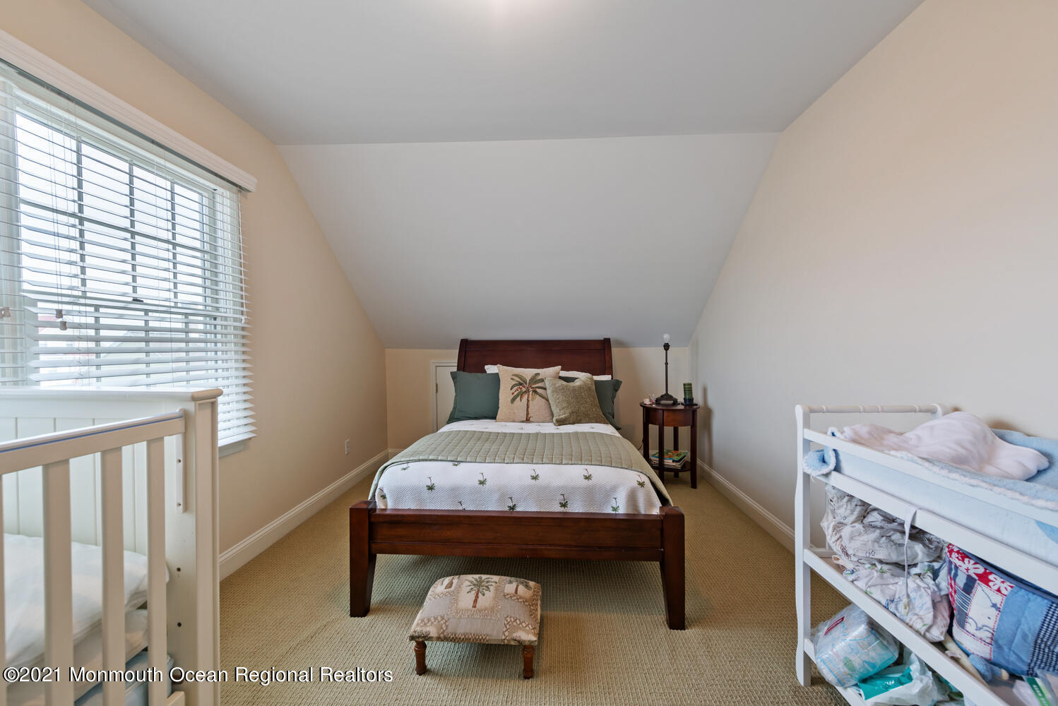 104 3rd Avenue Bradley Beach, NJ 07720 - Photo 27 of 40 a bedroom with a bed and a window