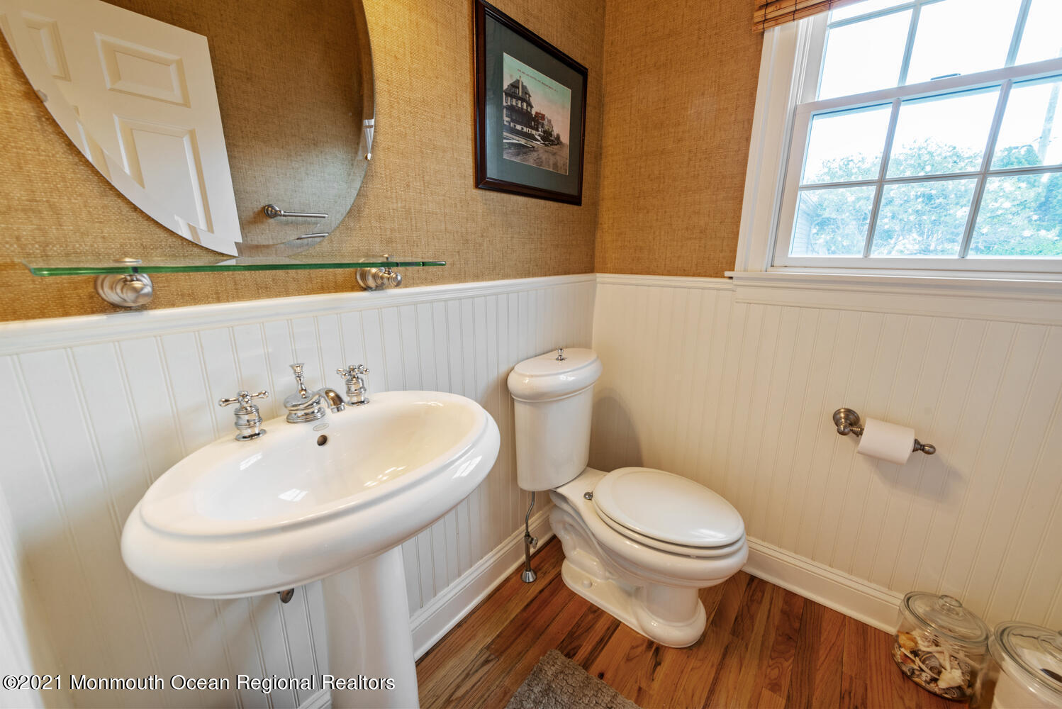 104 3rd Avenue Bradley Beach, NJ 07720 - Photo 28 of 40 a bathroom with a sink and a toilet