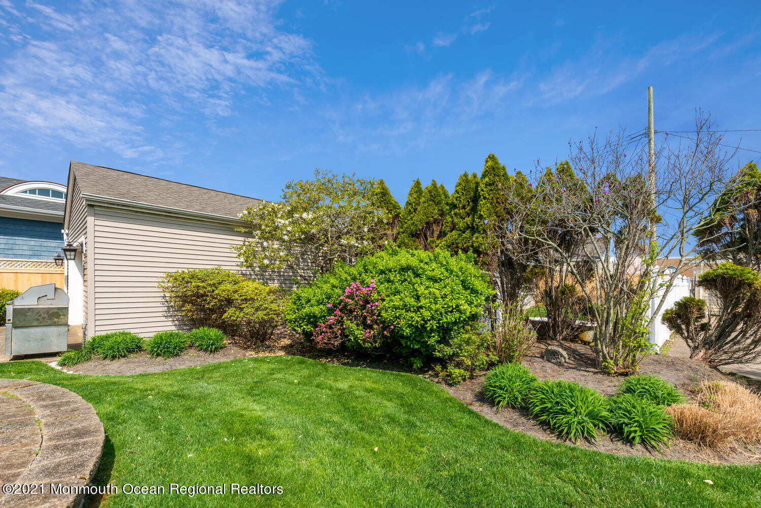 104 3rd Avenue Bradley Beach, NJ 07720 - Photo 34 of 40 a view of a backyard with potted plants and large tree