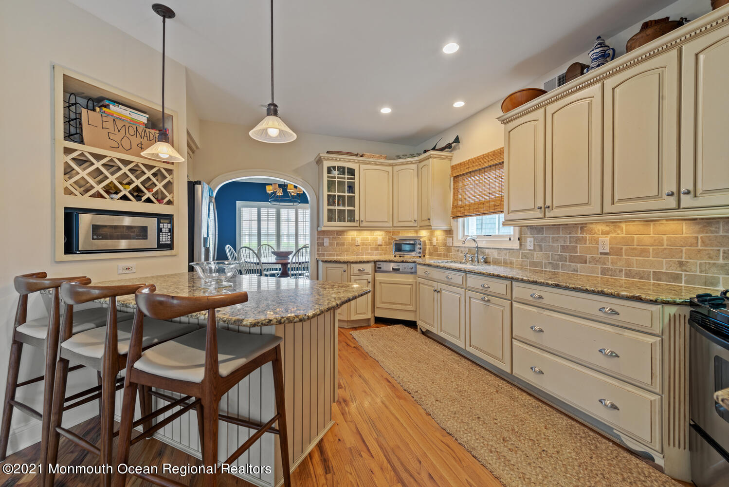 104 3rd Avenue Bradley Beach, NJ 07720 - Photo 10 of 40 a kitchen that has a lot of cabinets in it and stainless steel appliances