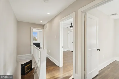 a bathroom with a sink and a walk in closet