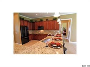 556 Quicksilver Trail Fort Mill, SC 29708 - Photo 2 of 15 a room with furniture and a flat screen tv