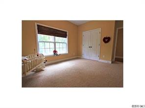 556 Quicksilver Trail Fort Mill, SC 29708 - Photo 10 of 15 a living room with furniture window and a wooden floor