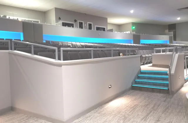 a kitchen with stainless steel appliances granite countertop a sink and a stove