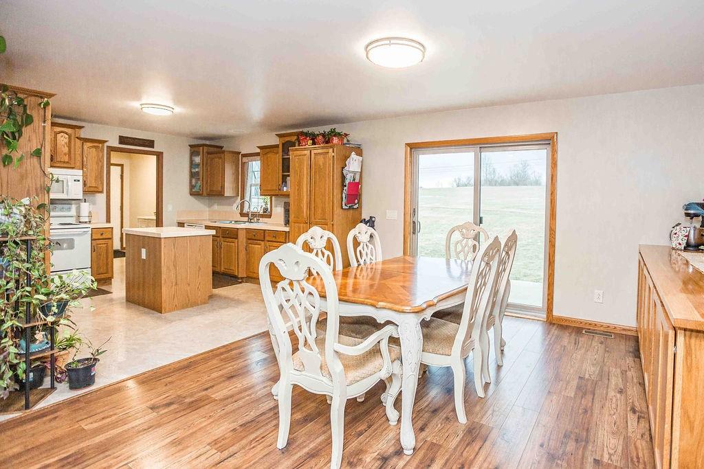 775 Clay Pike Road New Florence, PA 15944 - Photo 22 of 48 a view of a dining room with furniture and wooden floor