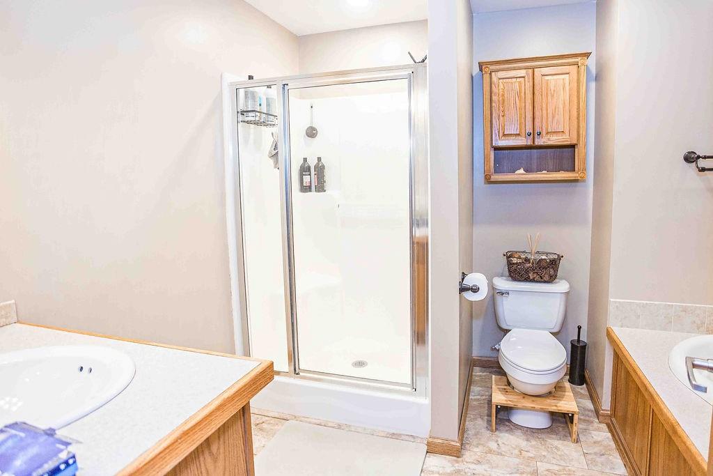 775 Clay Pike Road New Florence, PA 15944 - Photo 28 of 48 a bathroom with a granite countertop sink toilet and shower