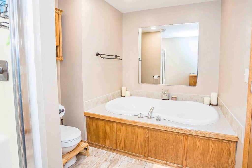 775 Clay Pike Road New Florence, PA 15944 - Photo 31 of 48 a bathroom with a granite countertop sink and a mirror