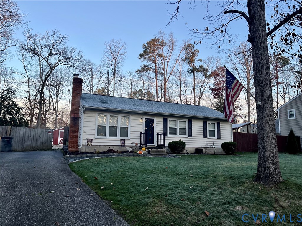 5212 Rollingway Road Chesterfield, VA 23832 - Photo 23 of 25 a front view of a house with garden
