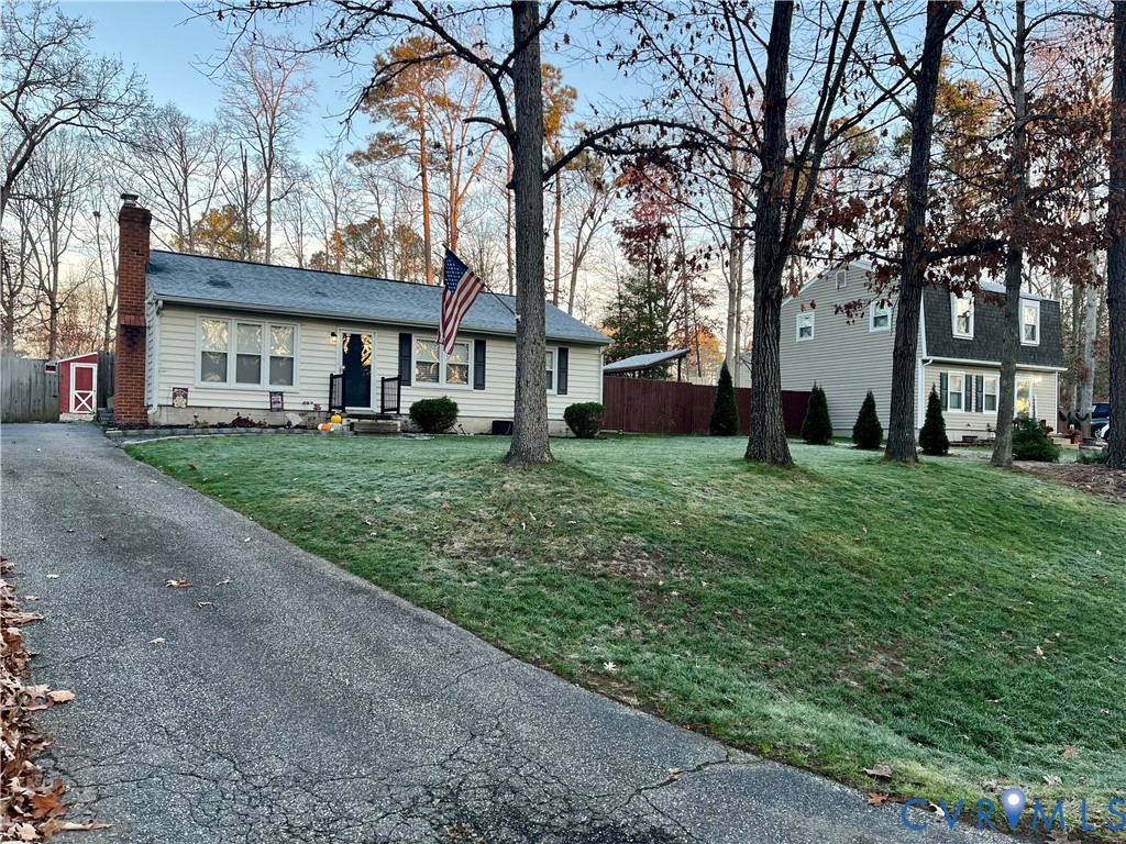 5212 Rollingway Road Chesterfield, VA 23832 - Photo 24 of 25 a tree in front of a white house