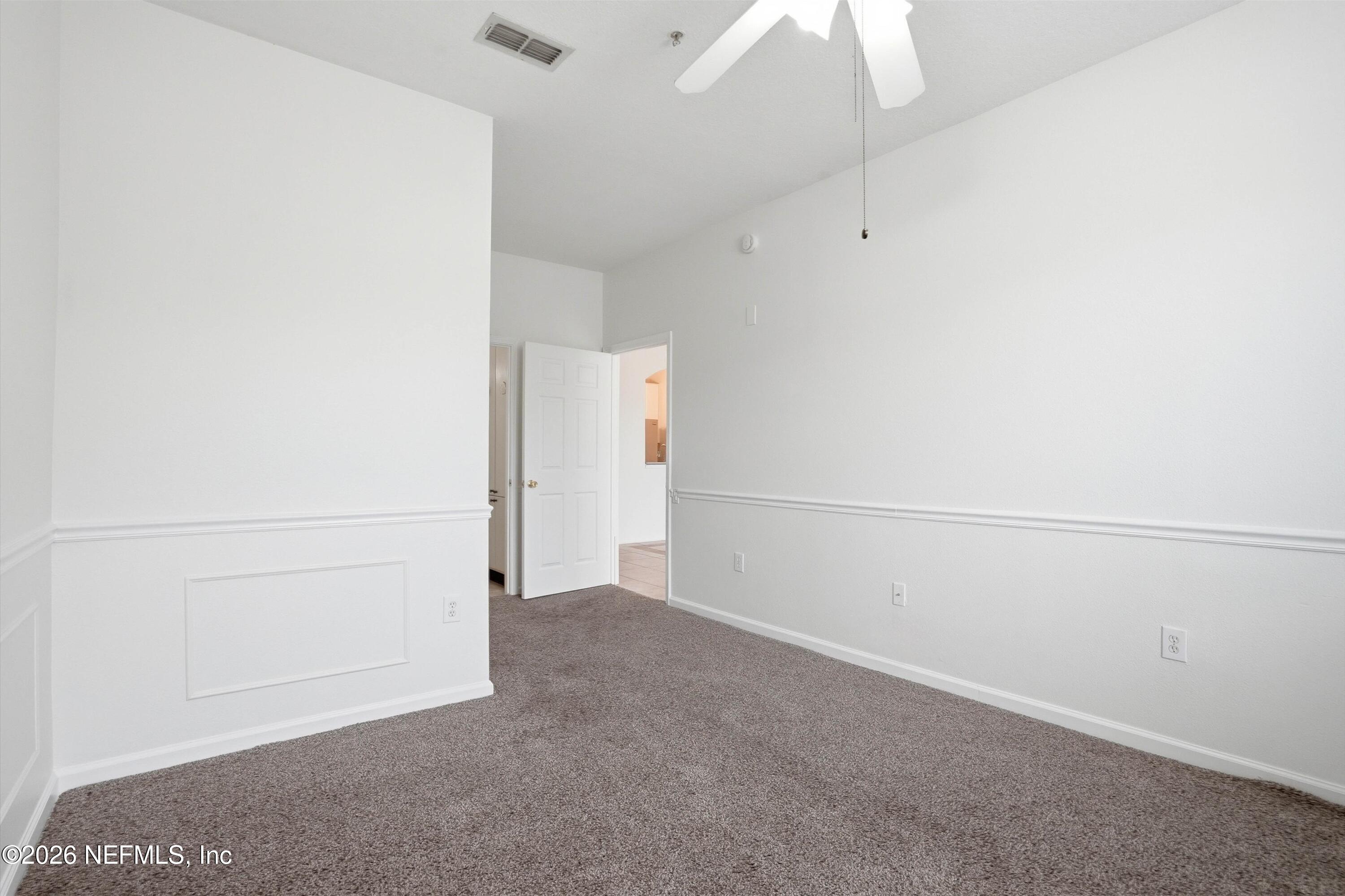 7990 Baymeadows Road East, Unit 918 Jacksonville, FL 32256 - Photo 22 of 37 17-Primary Bedroom