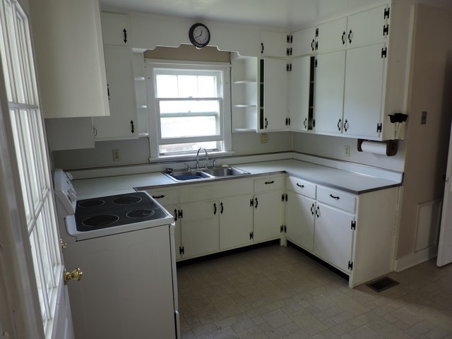 1838 Lyndhurst Road Waynesboro, VA 22980 - Photo 5 of 17 a kitchen with white cabinets sink and window