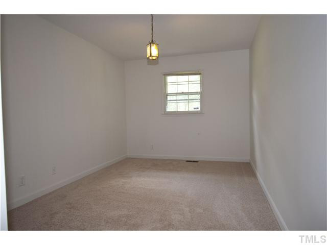 4317 Jimmy Rogers Road Durham, NC 27703 - Photo 22 of 25 5th bedroom off second hall with large closet Bedroom