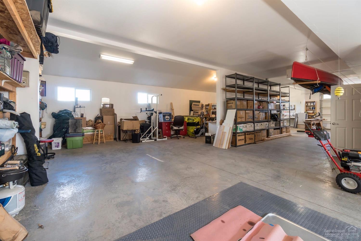 17939 Plainview Road Bend, OR 97703 - Photo 17 of 24 Huge shop w/ three roll-up doors, a half
