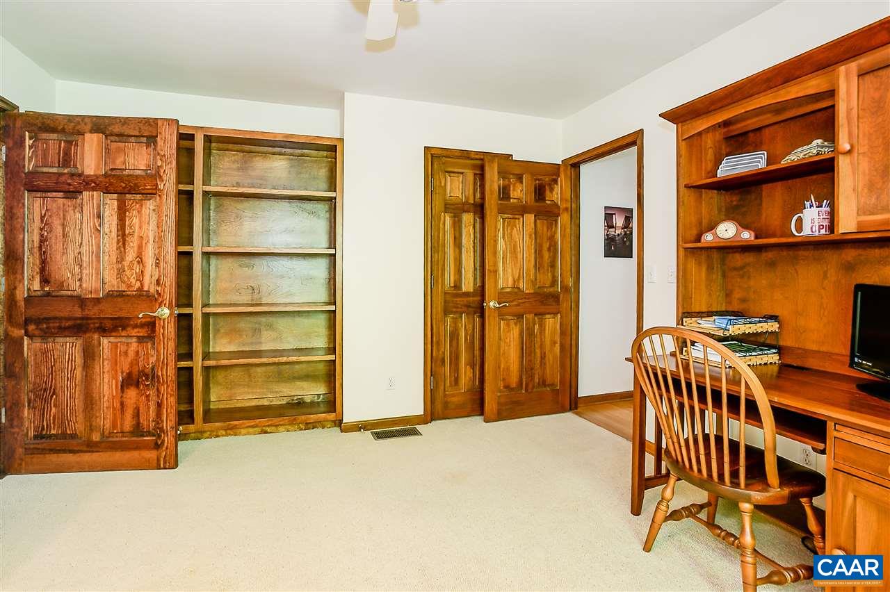 13 Woodridge Road Palmyra, VA 22963 - Photo 26 of 35 Walk-In closet, built-in bookcases. entrance to Home Office or Studio