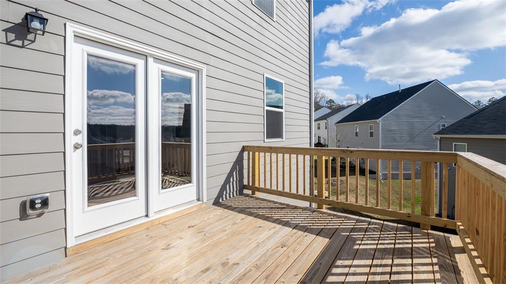 488 Bullock Pass Jefferson, GA 30549 - Photo 16 of 61 a view of a balcony with wooden floor