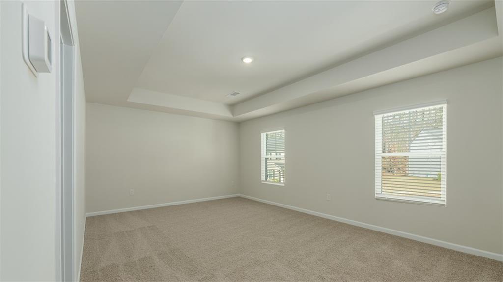 488 Bullock Pass Jefferson, GA 30549 - Photo 20 of 61 an empty room with windows