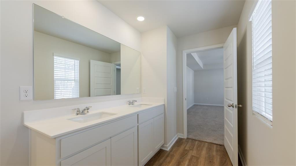 488 Bullock Pass Jefferson, GA 30549 - Photo 26 of 61 a bathroom with a sink a toilet and shower
