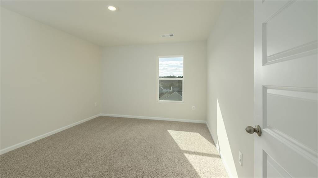 488 Bullock Pass Jefferson, GA 30549 - Photo 28 of 61 an empty room with a window