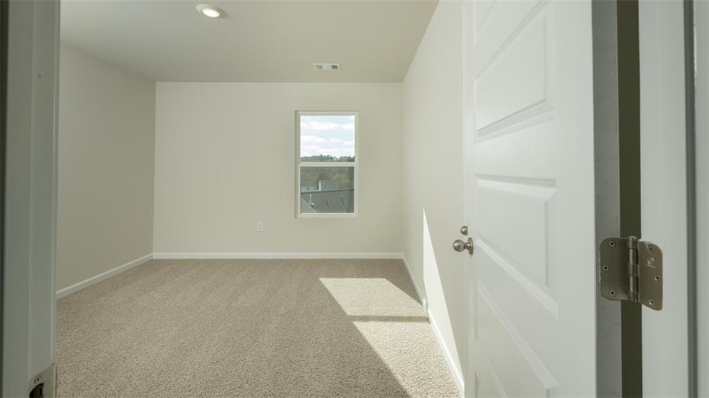 488 Bullock Pass Jefferson, GA 30549 - Photo 29 of 61 an empty room with windows