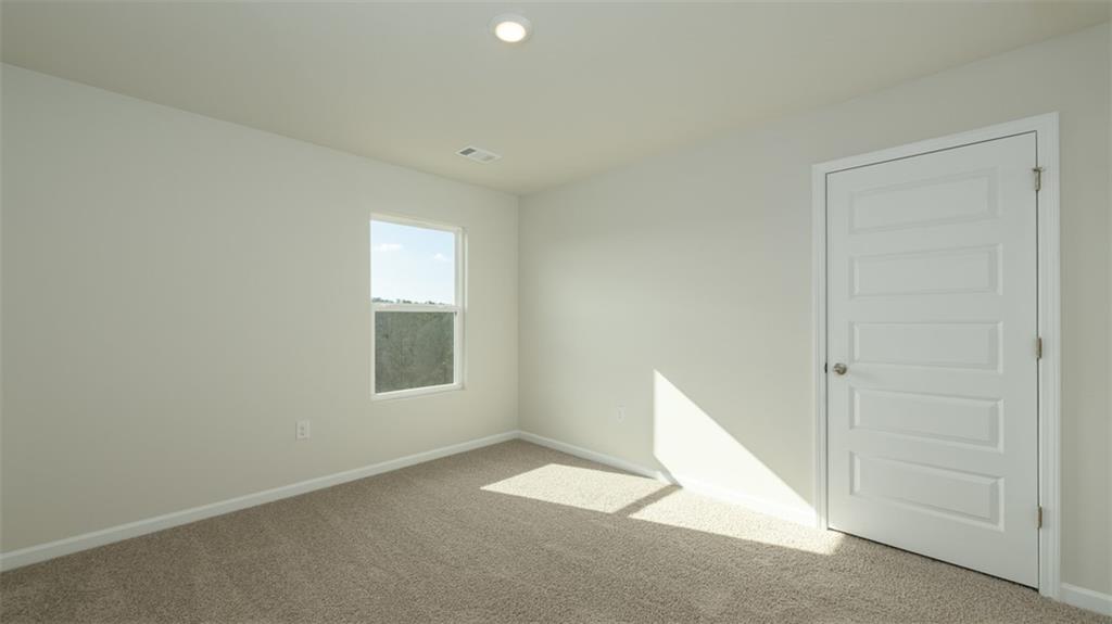 488 Bullock Pass Jefferson, GA 30549 - Photo 31 of 61 an empty room with windows