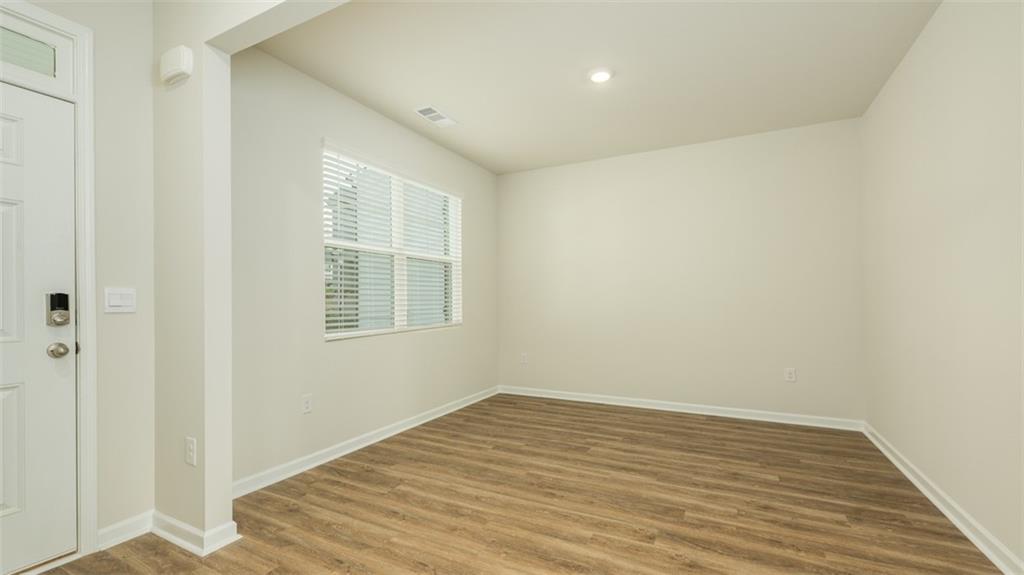 488 Bullock Pass Jefferson, GA 30549 - Photo 4 of 61 wooden floor in an empty room