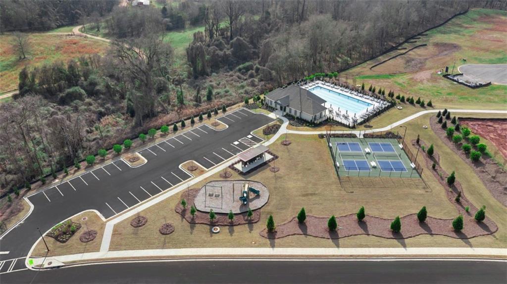 488 Bullock Pass Jefferson, GA 30549 - Photo 42 of 61 an aerial view of a house with garden space and parking