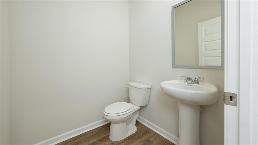 488 Bullock Pass Jefferson, GA 30549 - Photo 7 of 61 a bathroom with a sink and a toilet