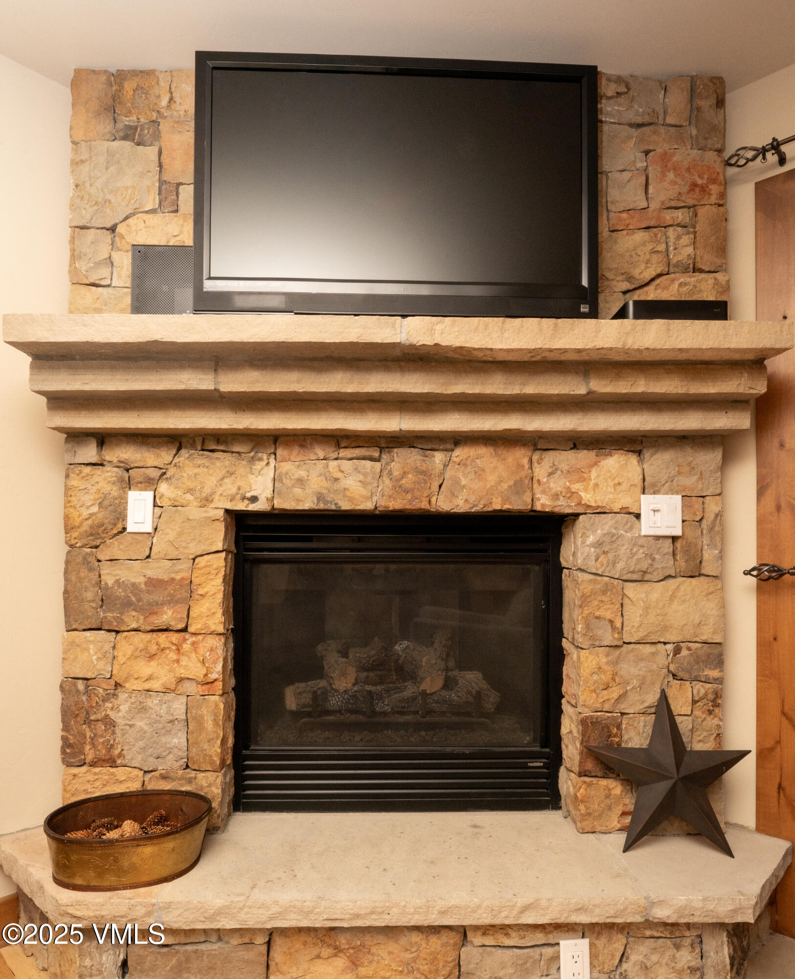 4690 Vail Racquet Club Drive, Unit 15A2 Vail, CO 81657 - Photo 4 of 20 VRC Stone Fireplace