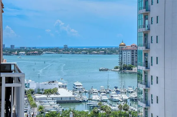 a view of a lake with building in front of it