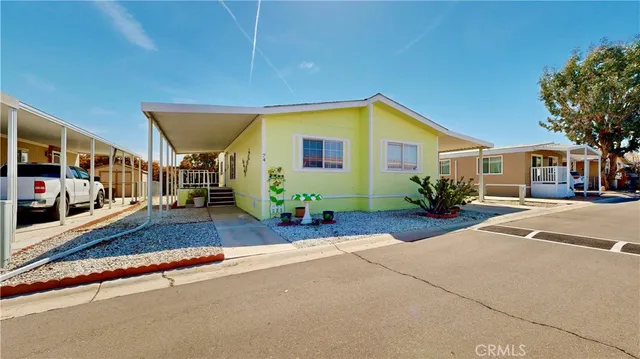 a view of a house with a street