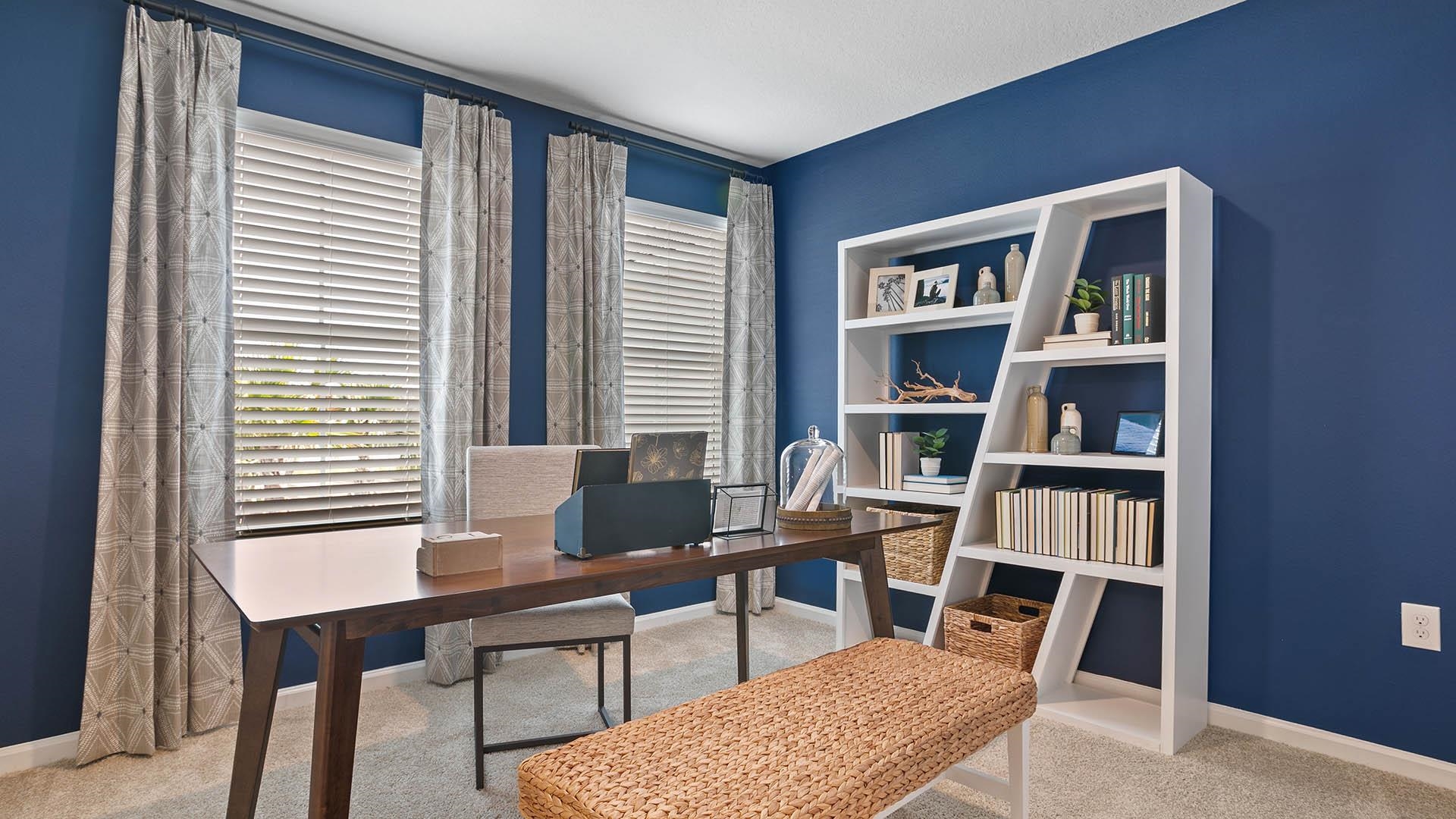 300 Redbud Road Palm Coast, FL 32137 - Photo 17 of 33 a view of a workspace with furniture and a bookshelf